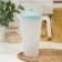 A jug with a lid, 2 l, 20 × 12 × 26 cm, pistachio color