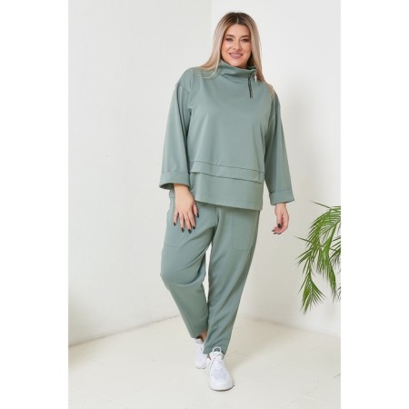 Female suit, size 68, green color