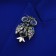 Owl brooch, color in black silver