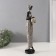 Polystone souvenir "African in a dress with leaves, with a pot" White with black 8.5x8x39 cm
