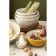 A set of 4 pyal cream/beige flowers with a relief pattern of the Taiga berries,
