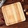 Menzhitsa is wooden, with a cutting board and a saucer, 25x25 cm, an array of ash