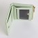 Women's wallet on the button, green color