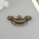 Handle for the casket metal "Patterns" bronze 9x4 cm