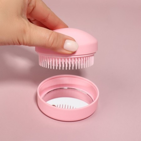 The comb is massage, round, folding, with a mirror, d = 7.5 cm, in the box, the color is pink-11