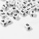 Acrylic bead "numbers and symbols" mix, cube 7 × 7 mm, set 10 g, white-black color