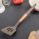 Bruttered blade with slots of the Brownie, 32 × 7 cm, gray/beige color
