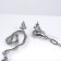 Hanging earrings with rhinestones “Star” with a spiral, white color in silver, 6.5 cm