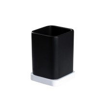 A glass for dental brushes, 12x7.3x7.3 cm, black and white