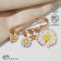 Pin "Flower" 4 pendants, 5 cm, white-yellow color in gold