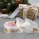 Satin tape with embossing "deer in the harness", 25 mm, 23 ± 1 m, white color/gold No. 01
