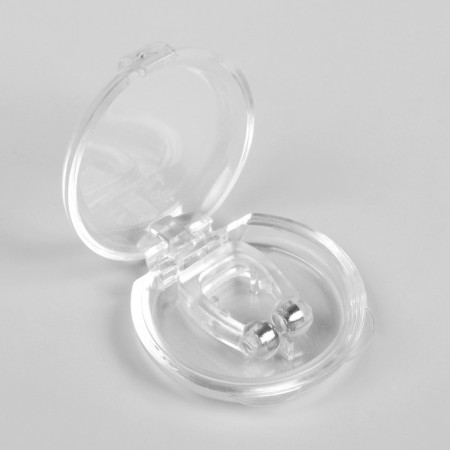 A snore device, in a case, with a magnet, the color is transparent-1