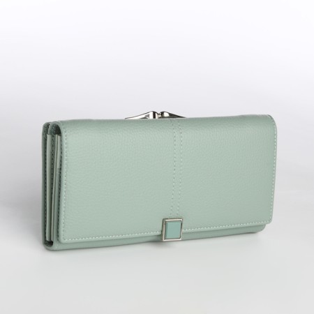 Women's wallet on magnet, green color