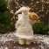 Santa Claus "with bows on shoes and with a flashlight" 30 cm, golden-white
