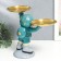 Souvenir Polystone stand "Cosmonaut in turquoise with two dishes" 14x26.5x32 cm