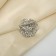 Ring for the openwork "openwork" flowers, white color in silver