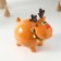 Piggy bank Ceramics "Singing Deer, in a collar with bells" 9.8x14x15.1 cm