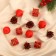 A set of jewelry plastic 12 pcs "Christmas tree" (4 balls, 4 gifts, 4 cones) mix