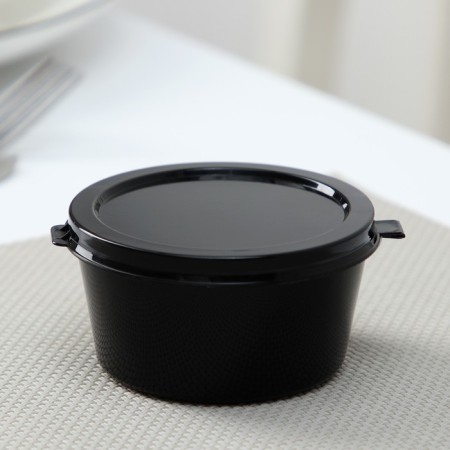 The container is a plastic disposable sauce with an insoluble lid, 80 ml, black color