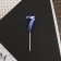 Candle for the cake, the number "7", blue.