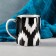 Atlas mug in gold
