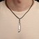 Male “Machete” pendant, black color on a black lace, 40 cm