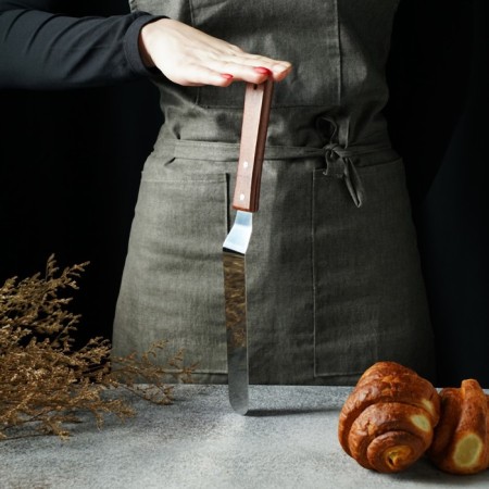 A blade-tank with a wooden handle, curved, 31.5 cm, the working part is 19.5 cm-7