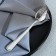 A teaspoon spoon with an engraving “Favorite Dad”, on a gift postcard, 3 x 14 cm.