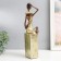 Souvenir Polystone "African with a jug, on the stand" Gold Pattern - circles 10.5x8x33.5 cm