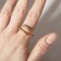 The ring "minimal" two lines, the color of gold, dimensionless