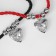 Set 3 objects: 2 bracelets, lip gloat "Demetrons" hearts, black-red color, 6 cm