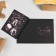 A postcard on the black craft "We need everything", 12 x 16 cm, New Year