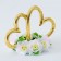 Hearts with flowers are pale pink. Fixed to the ribbons