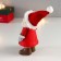 Souvenir Polystone "Santa Claus in red, with a curly beard with a Christmas tree" 15x6x8 cm