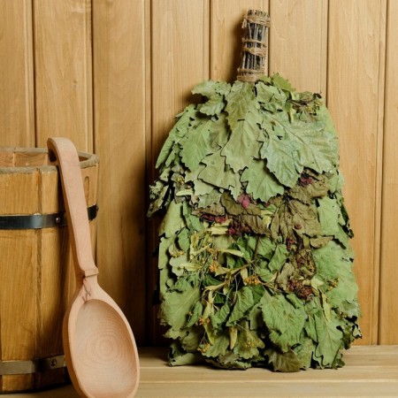 A broom for a bath oak "Forest aromas" with herbs, in individual packaging