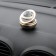 The accessory on the panel, gravitational rings, rotates from the sun, gold