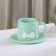 Tea couple ceramic with a spoon "Bow", 2 items: a mug 350 ml, a saucer d = 15 cm, green color
