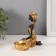 Souvenir Polystone Summary "African Rudo in a gold dress at the basin" d = 4 cm 9.5x12.5x14 cm