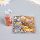 Decor "Semiobusins ​​and rhinestones. Gradient Orange-yellow" d = 4 mm 10g 200 pcs 5x2.5 cm, mix
