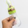 A bottle for feeding, silicone, with a spoon, from 5 months, 90 ml, green color