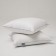 The pillow is low, size 70x70 cm, color mix