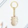 Key keychain for children, metal "raccoon", 2.8 x 4.3 cm
