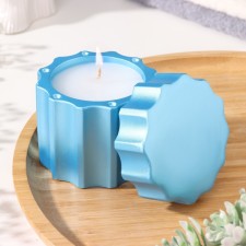 A candle in a candlelight made of gypsum with a lid with wide edges, 7.5x8.5cm, blue