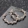Roaling earrings "Pearl thread" d = 4.5, white color in silver