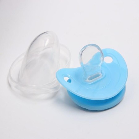 A dummy with a holder, orthodontic, from 0 months, types and colors of mix