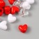 Plastic beads "Heart. Red, white, transparent" set of 20 g 1.2x0.9x0.8 cm