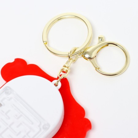 Puzzle-labyrinth "Monkey" with a calculator, on a keychain, color mix-7