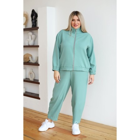 Female suit, size 56, light green color