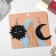 Acryl Earrings "crescent and sun", black and white color in silver