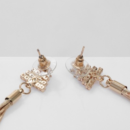 Hanging earrings with the rhinestones "Odyssey" a triangle, the color is white in gold-1